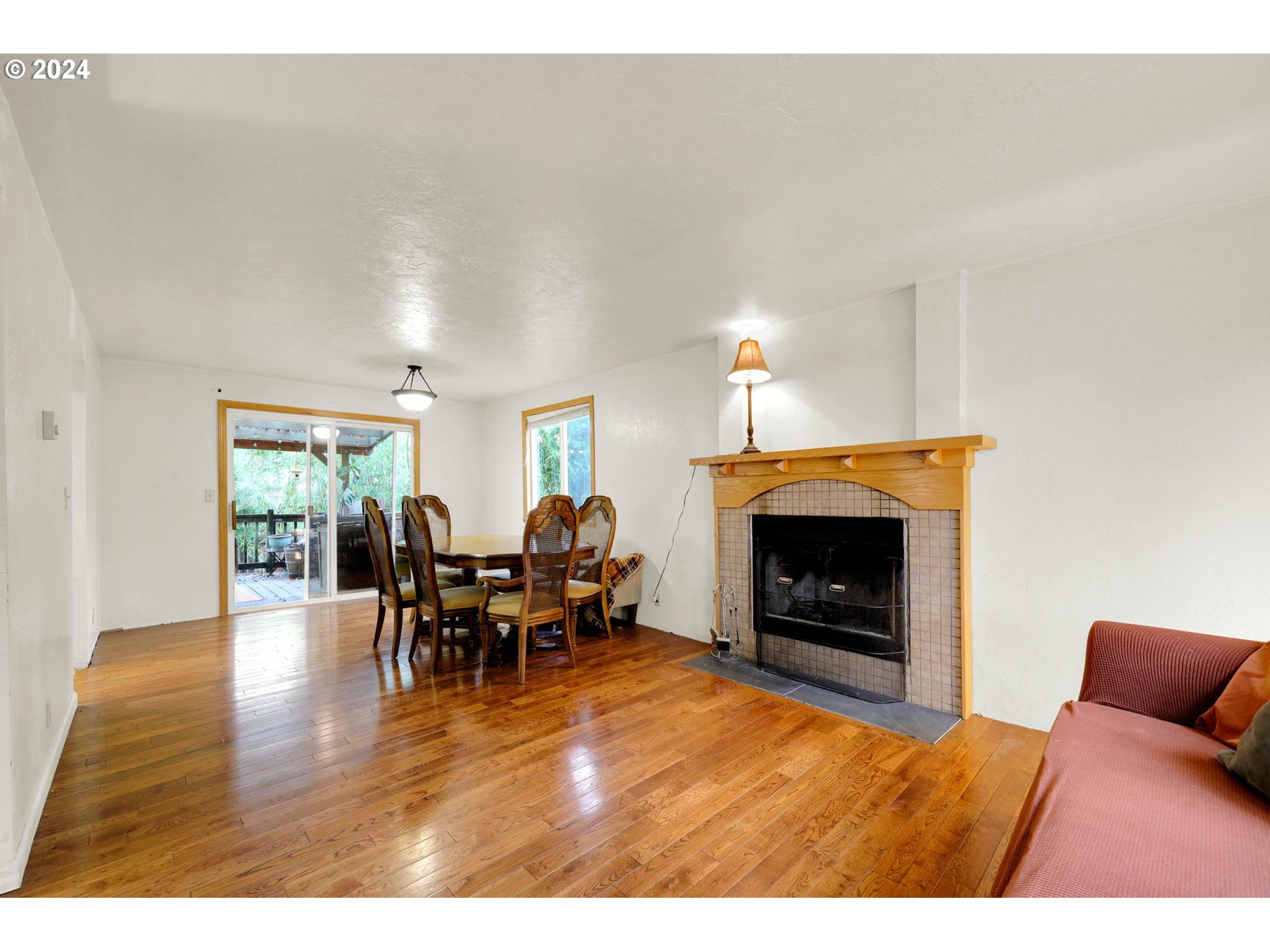 590 South 71st Street Springfield, OR 97478 - Photo 8 of 44 a living room with furniture and a fireplace
