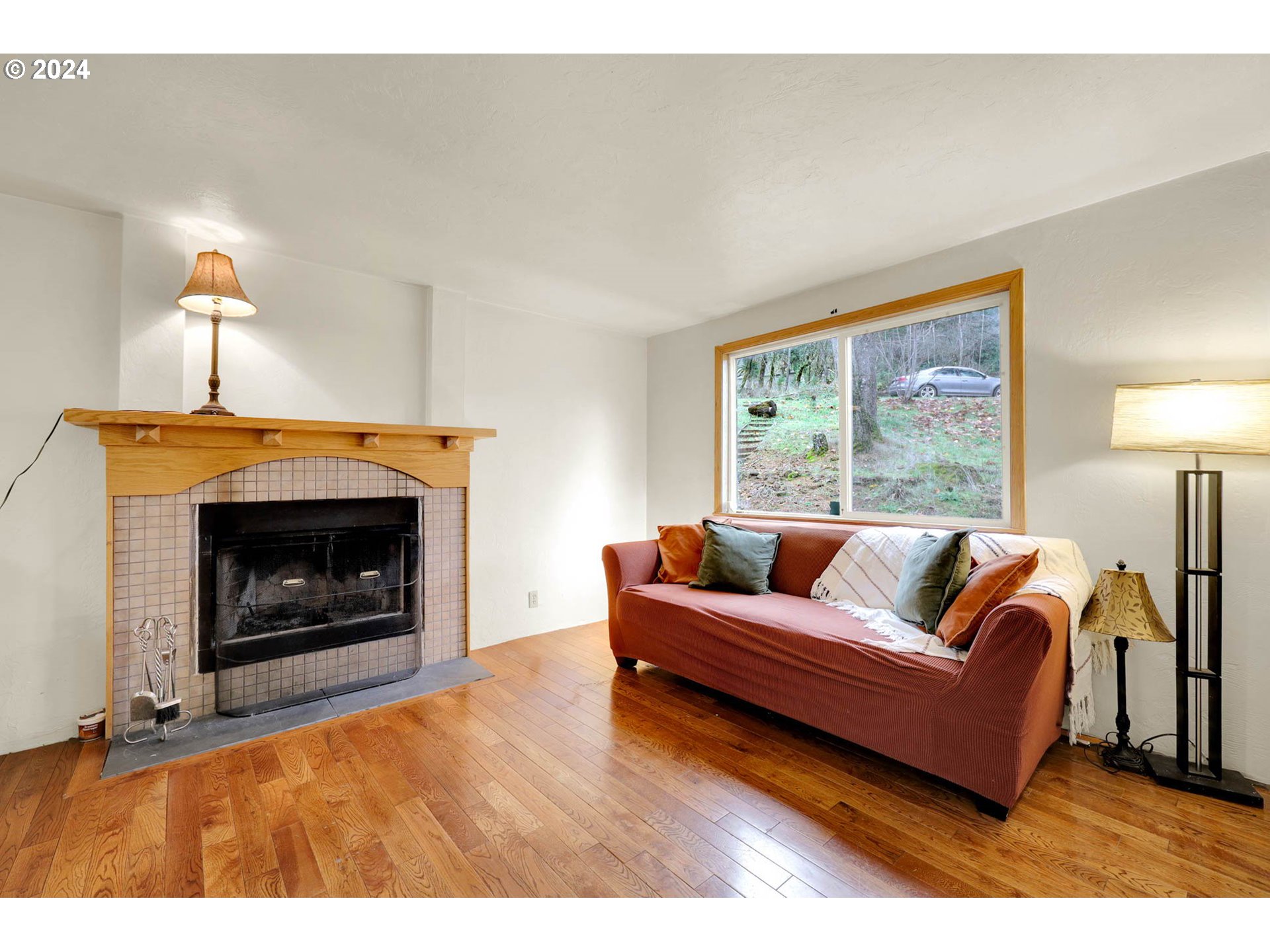 590 South 71st Street Springfield, OR 97478 - Photo 9 of 44 a living room with furniture and a fireplace