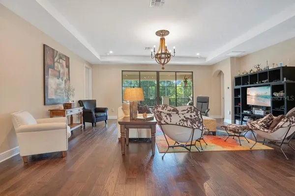 a view of balcony with wooden floor