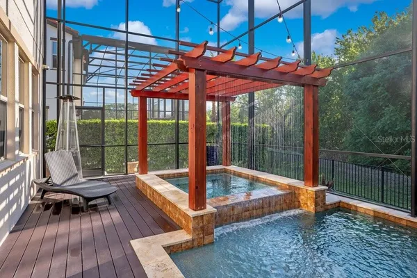 a outdoor space with furniture and a fireplace