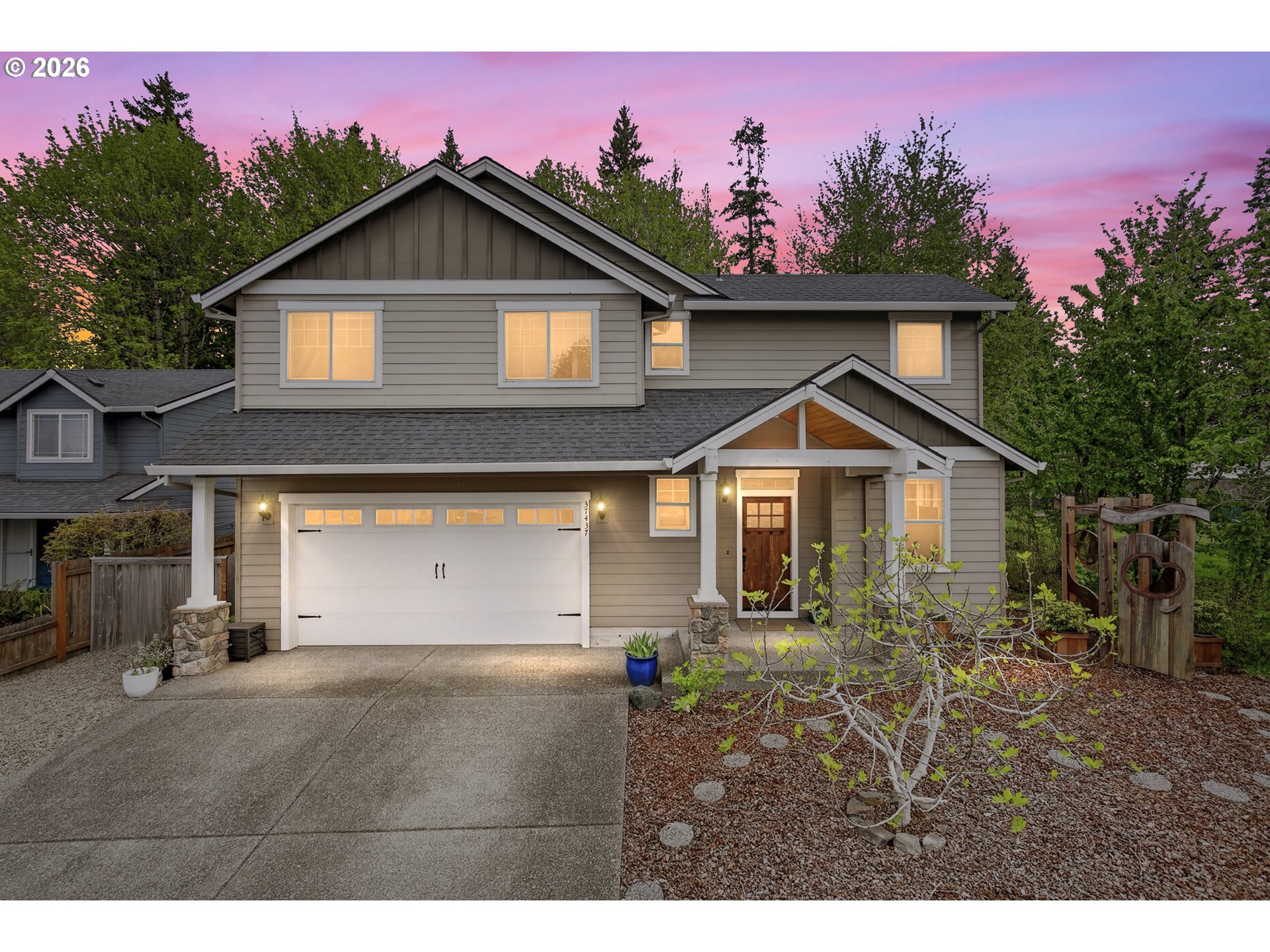 37437 Southeast Olson Street Sandy, OR 97055 - Photo 1 of 48 a front view of a house with a yard
