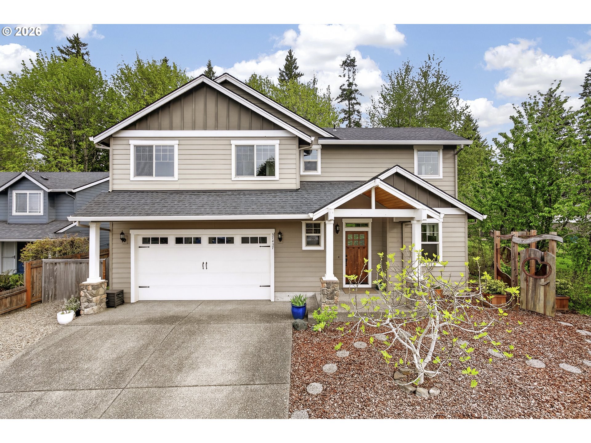 37437 Southeast Olson Street Sandy, OR 97055 - Photo 2 of 48 a view of a house with a yard