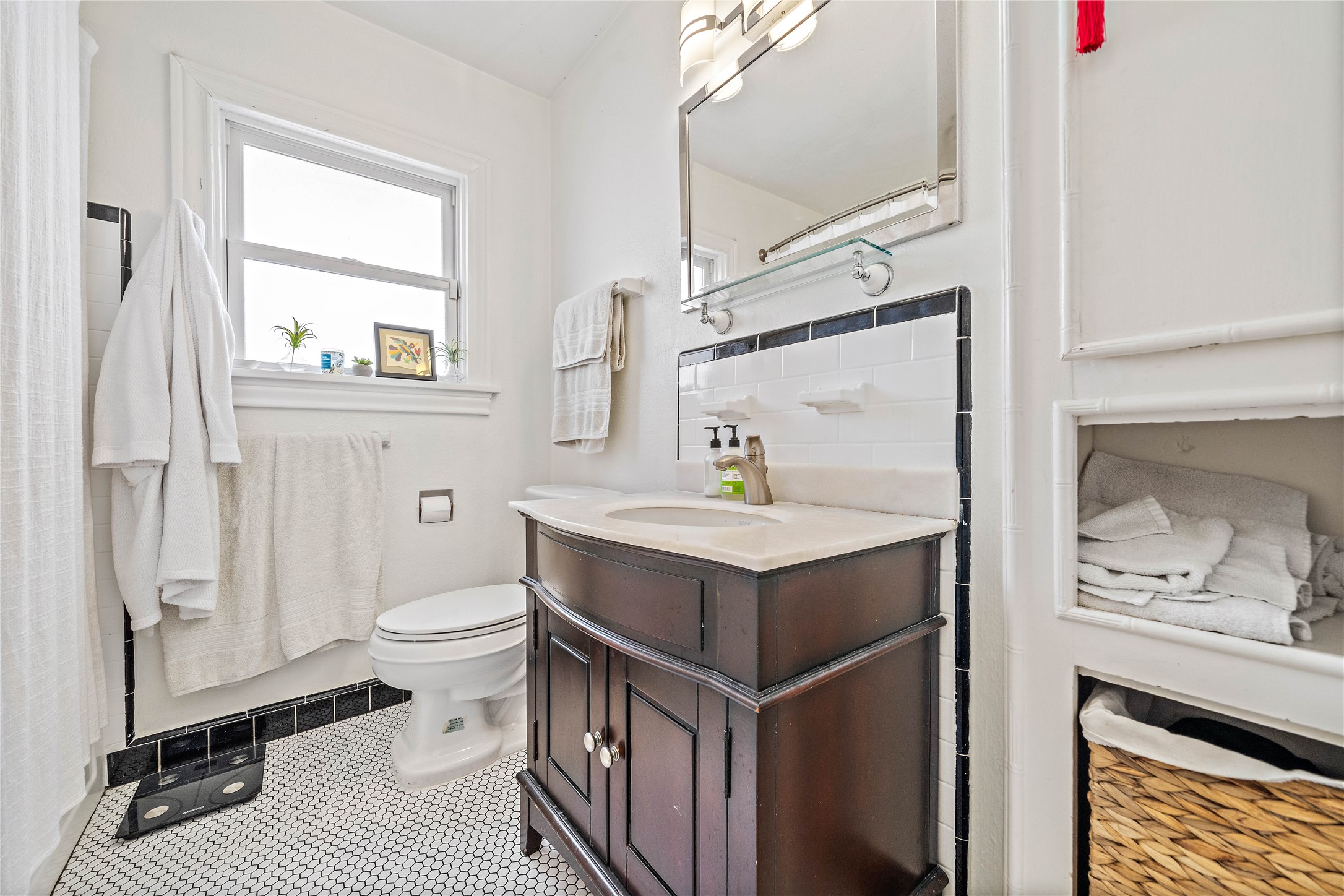 2324 Goldsmith Street, Unit A Houston, TX 77030 - Photo 19 of 30 a bathroom with a sink toilet and shower