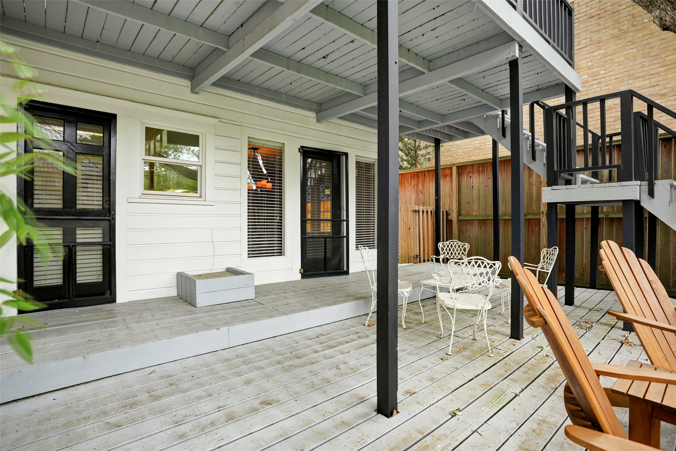 2324 Goldsmith Street, Unit A Houston, TX 77030 - Photo 23 of 30 a front view of a house with outdoor seating