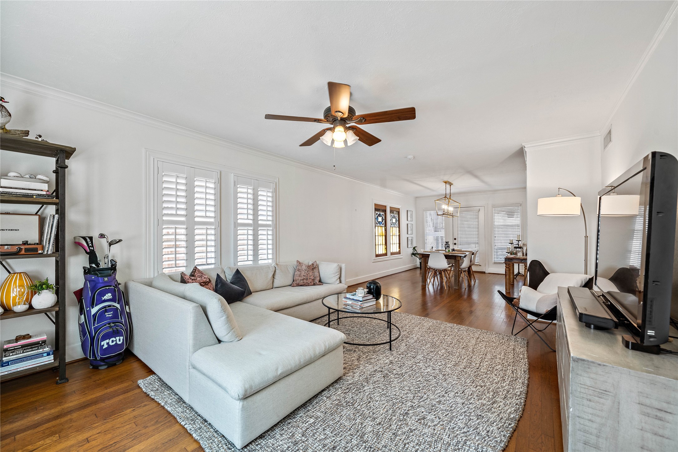 2324 Goldsmith Street, Unit A Houston, TX 77030 - Photo 3 of 30 a living room with furniture a flat screen tv and a large window