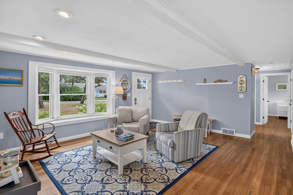 50 Pine Ridge Road Chatham, MA 02633 - Photo 10 of 42 a living room with furniture and a window