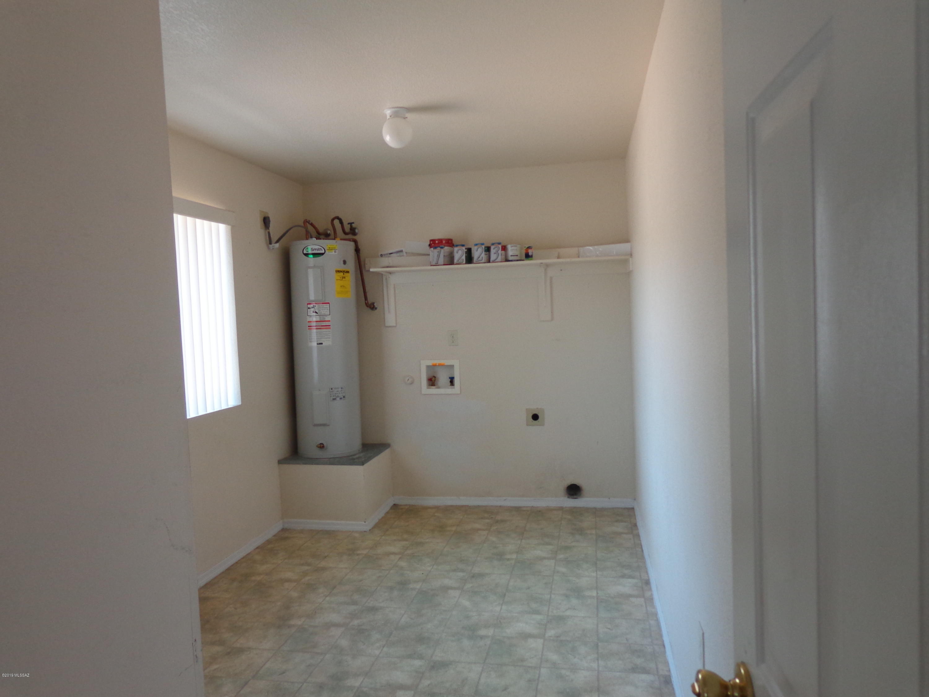 1223 Yave Court Rio Rico, AZ 85648 - Photo 6 of 15 a view of an empty room