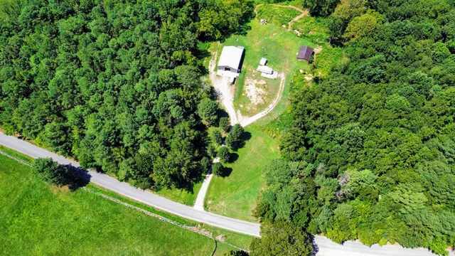 a small garden is sitting in the grass