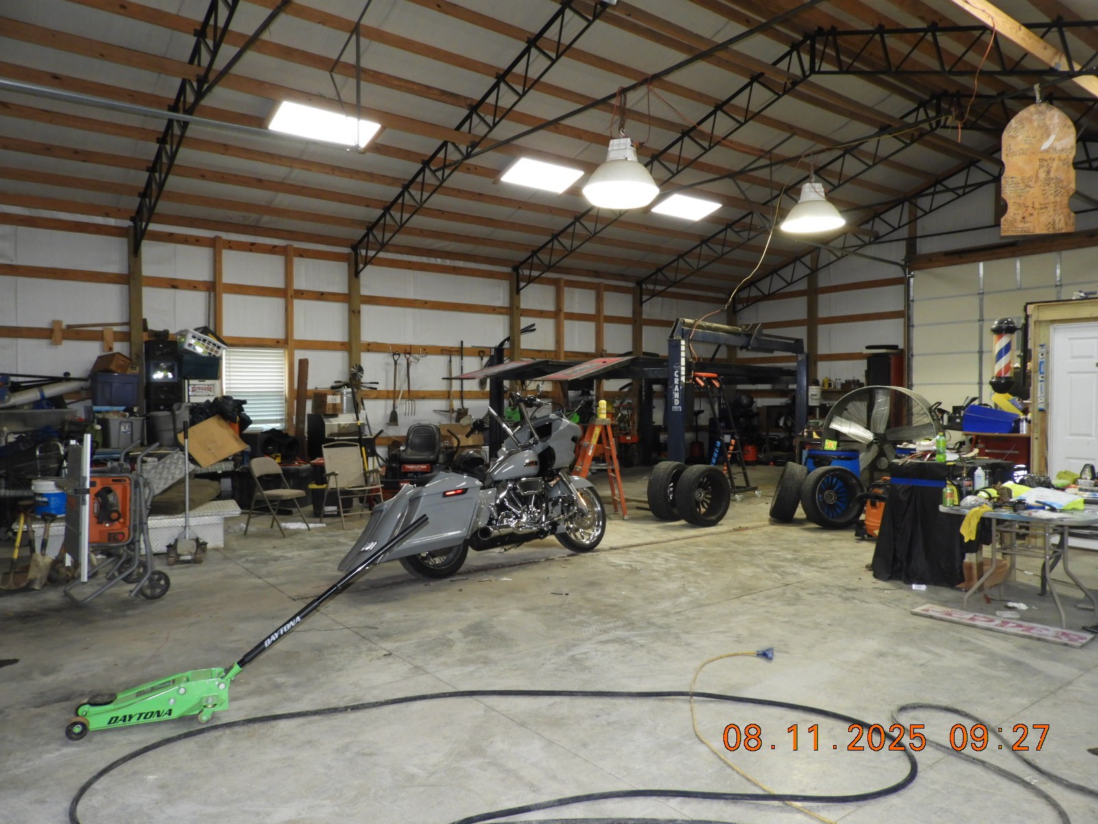 1240 Johnson Branch Road Pulaski, TN 38478 - Photo 39 of 68 a view of a garage with a bike and car