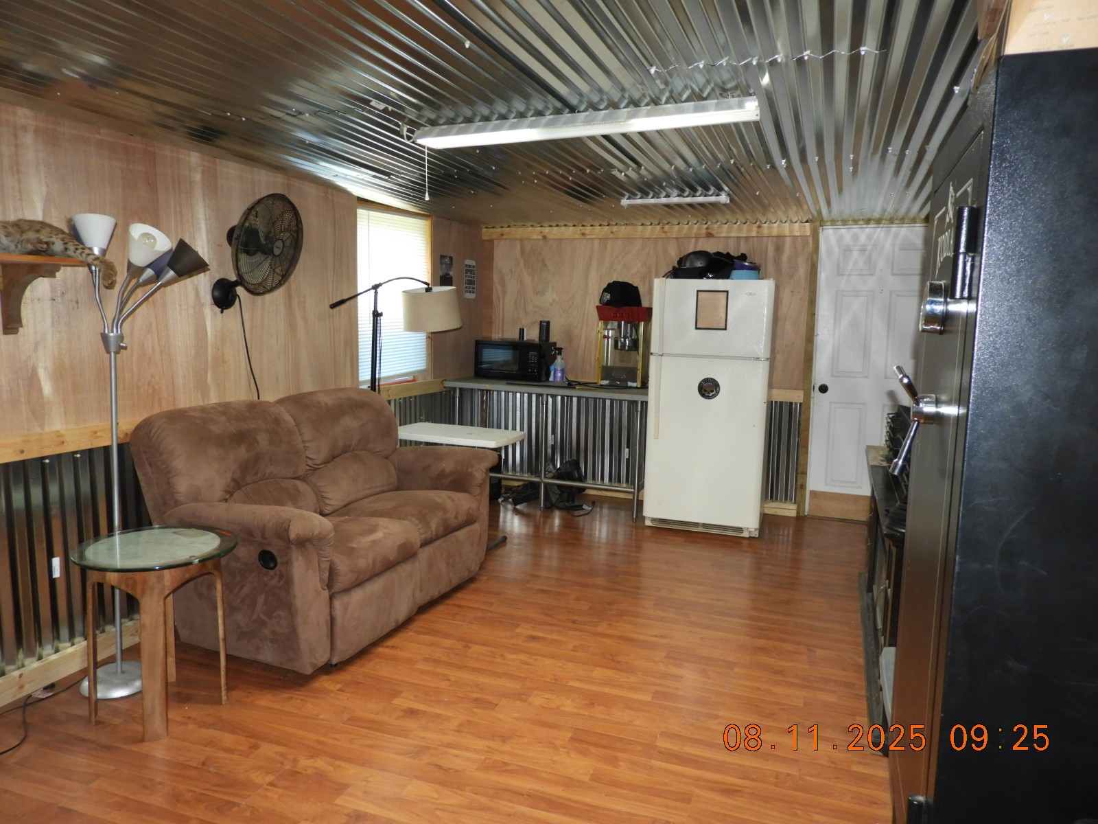 1240 Johnson Branch Road Pulaski, TN 38478 - Photo 52 of 68 a living room with furniture and a clock