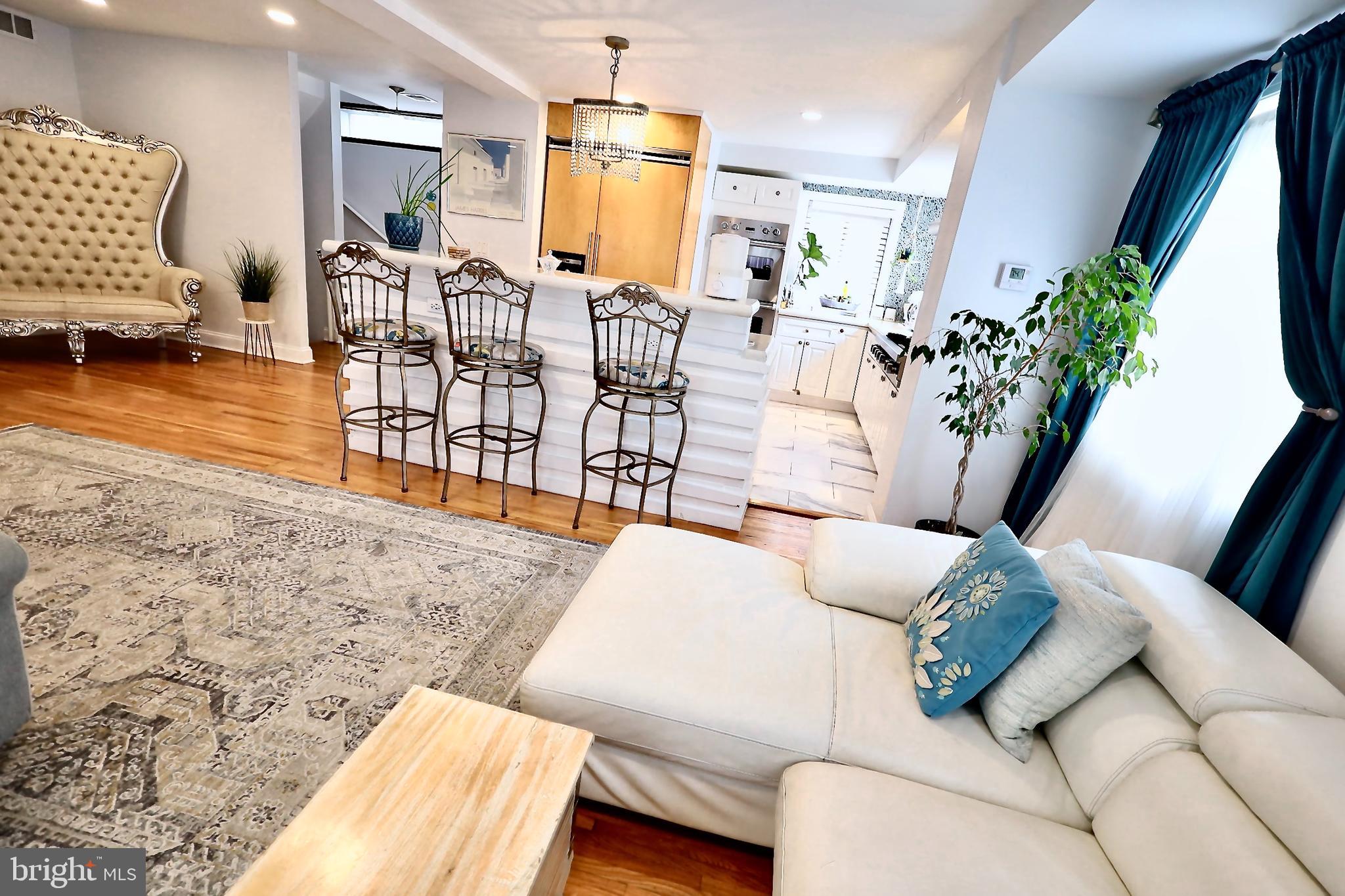 701 Lombard Street Philadelphia, PA 19147 - Photo 2 of 59 a living room with furniture and wooden floor
