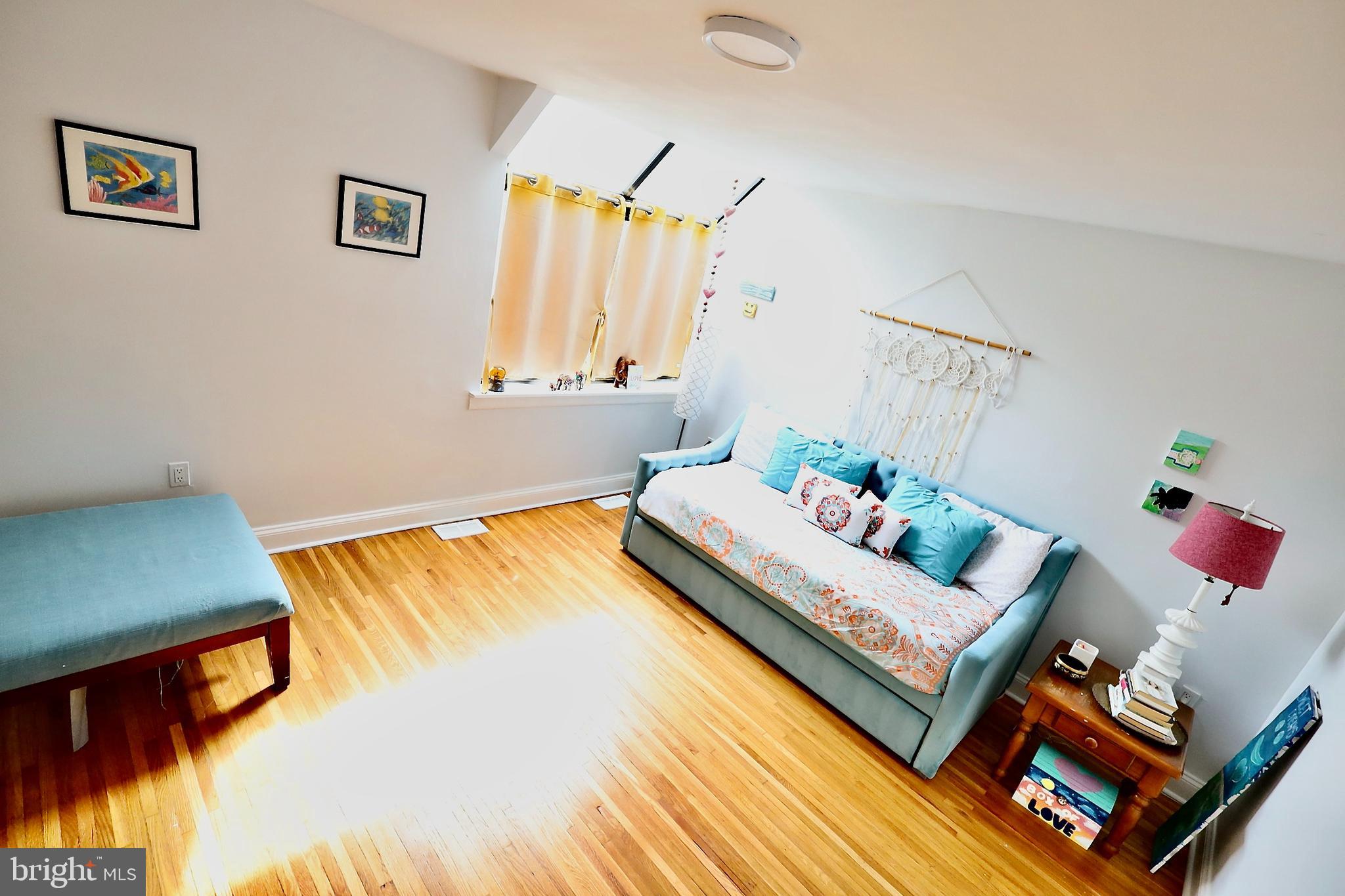 701 Lombard Street Philadelphia, PA 19147 - Photo 24 of 59 a living room with furniture and a window