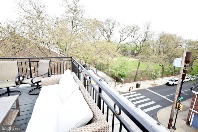 a view of a roof deck with couches