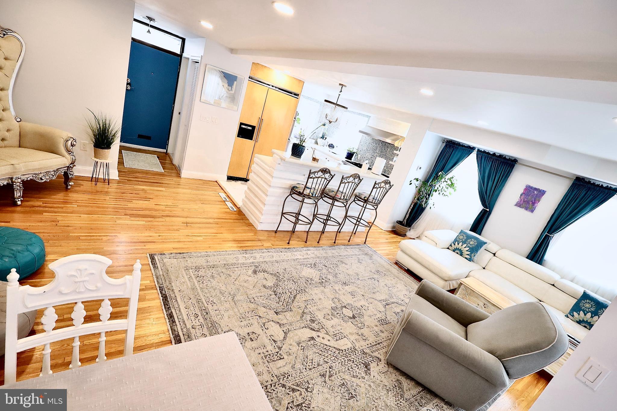 701 Lombard Street Philadelphia, PA 19147 - Photo 5 of 59 a living room with furniture and a flat screen tv