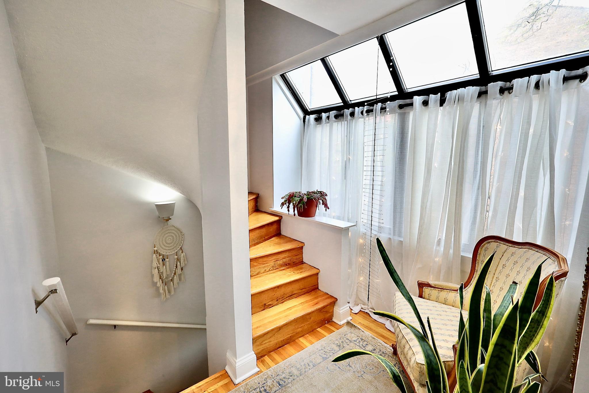 701 Lombard Street Philadelphia, PA 19147 - Photo 52 of 59 a view of staircase with open kitchen