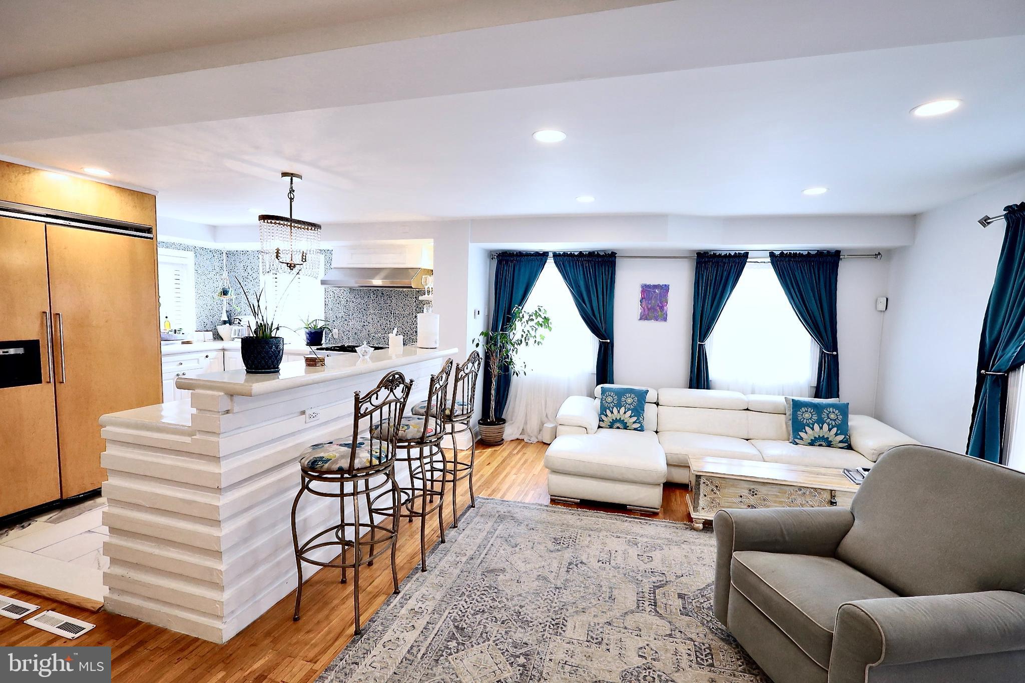 701 Lombard Street Philadelphia, PA 19147 - Photo 7 of 59 a living room with furniture and a large window