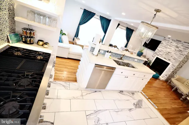 a view of living room with furniture and flat screen tv