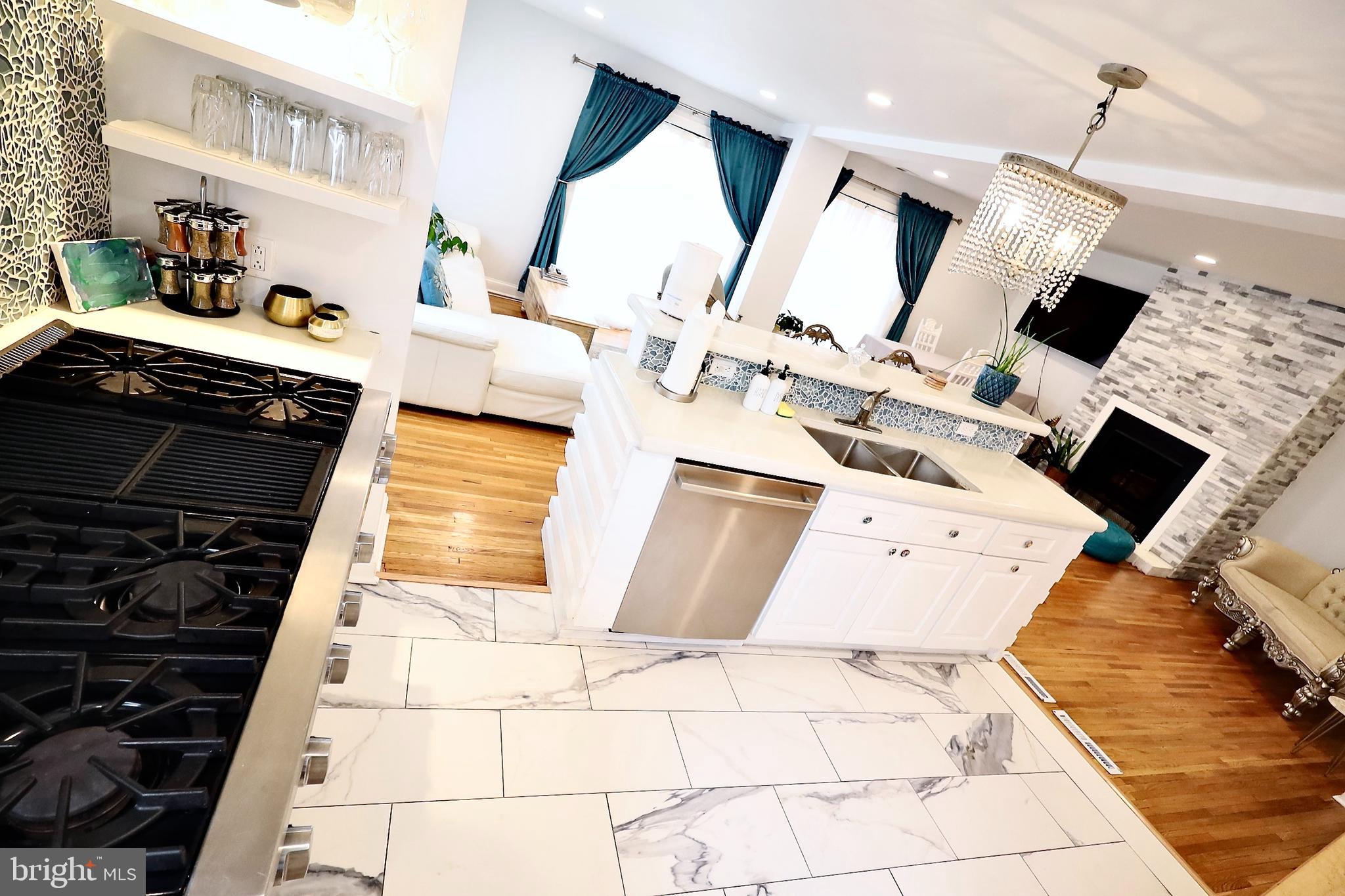 701 Lombard Street Philadelphia, PA 19147 - Photo 8 of 59 a view of living room with furniture and flat screen tv