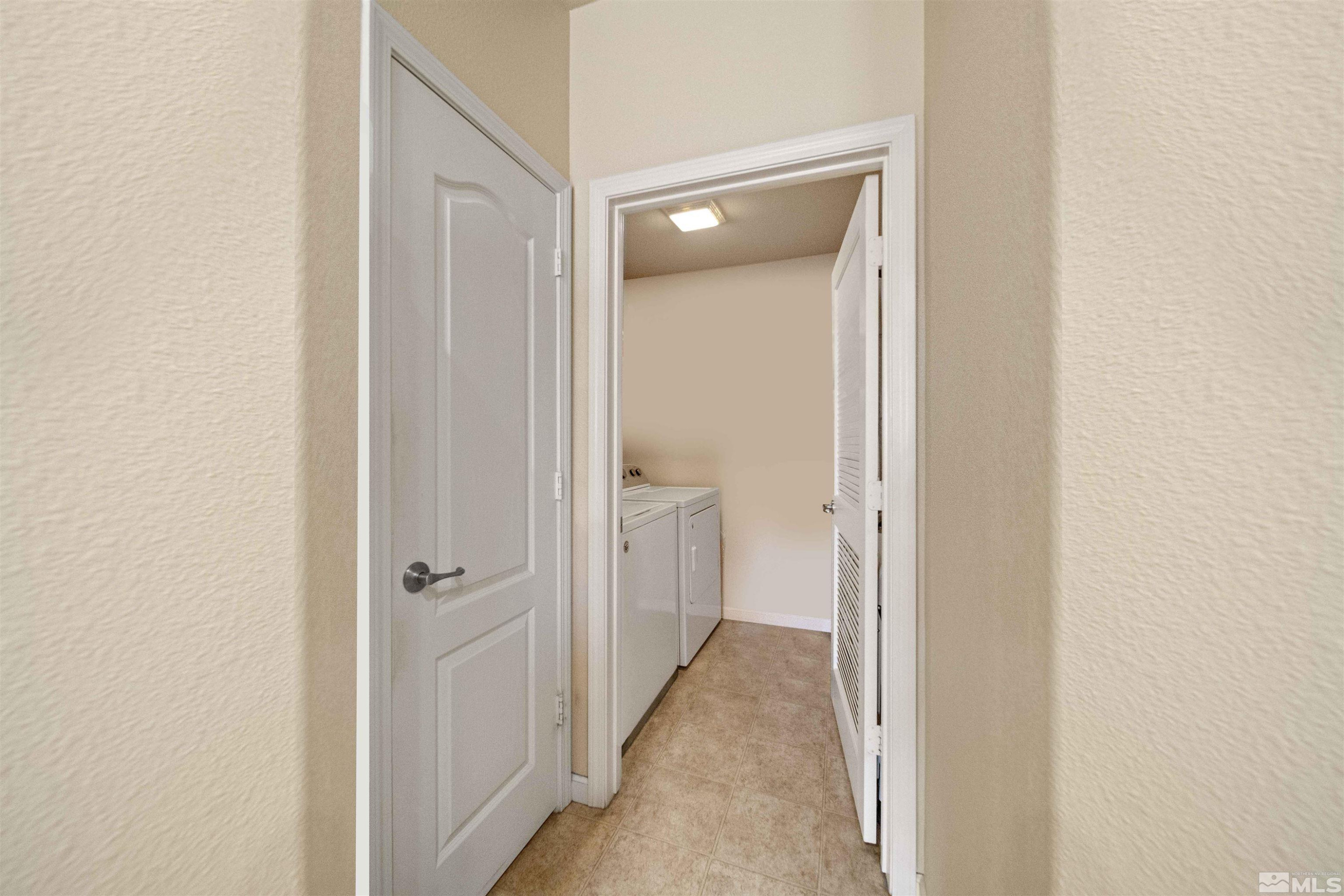 17000 Wedge Parkway Reno, NV 89511 - Photo 12 of 35 a view of a bathroom from the hallway