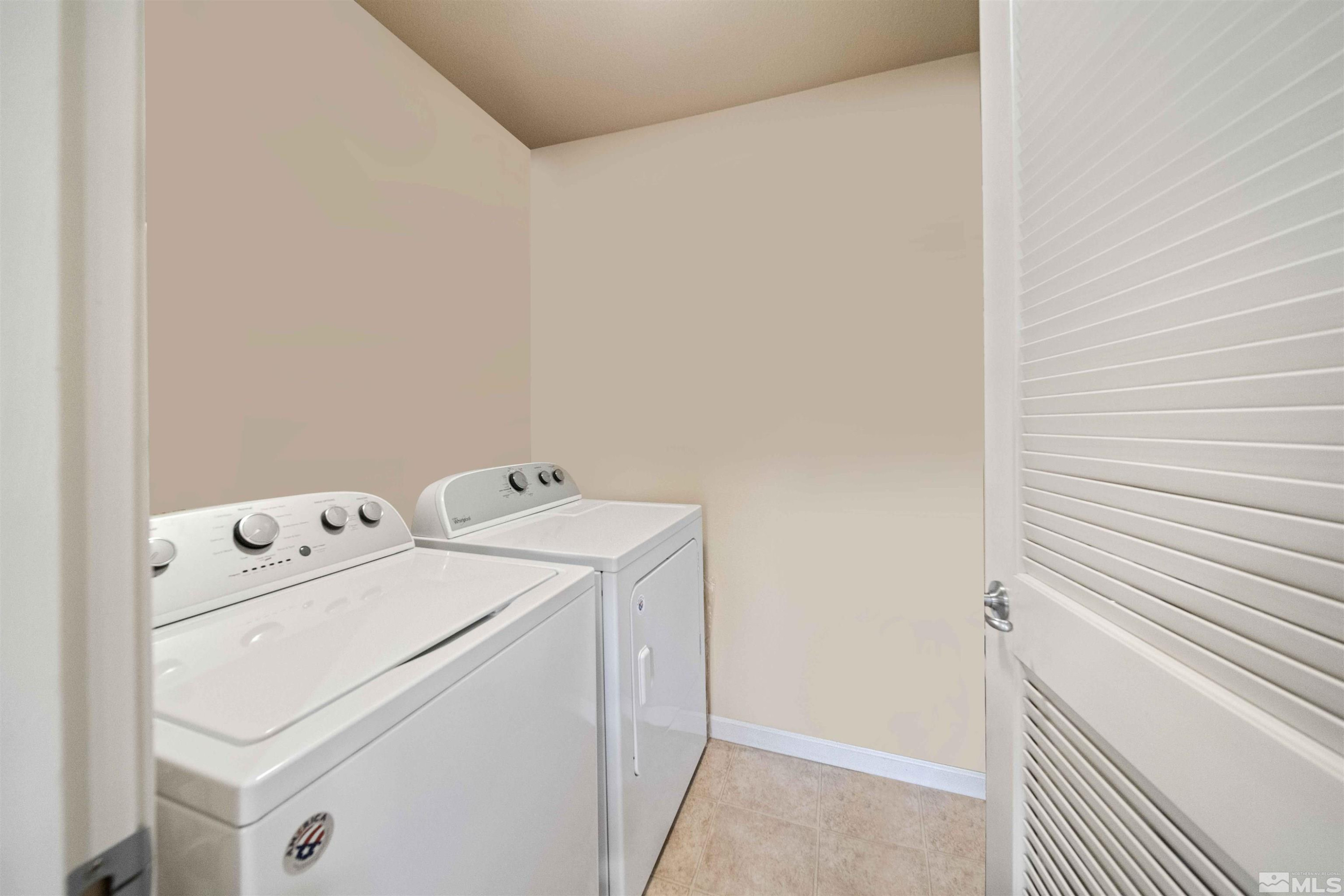 17000 Wedge Parkway Reno, NV 89511 - Photo 15 of 35 a utility room with dryer and washer
