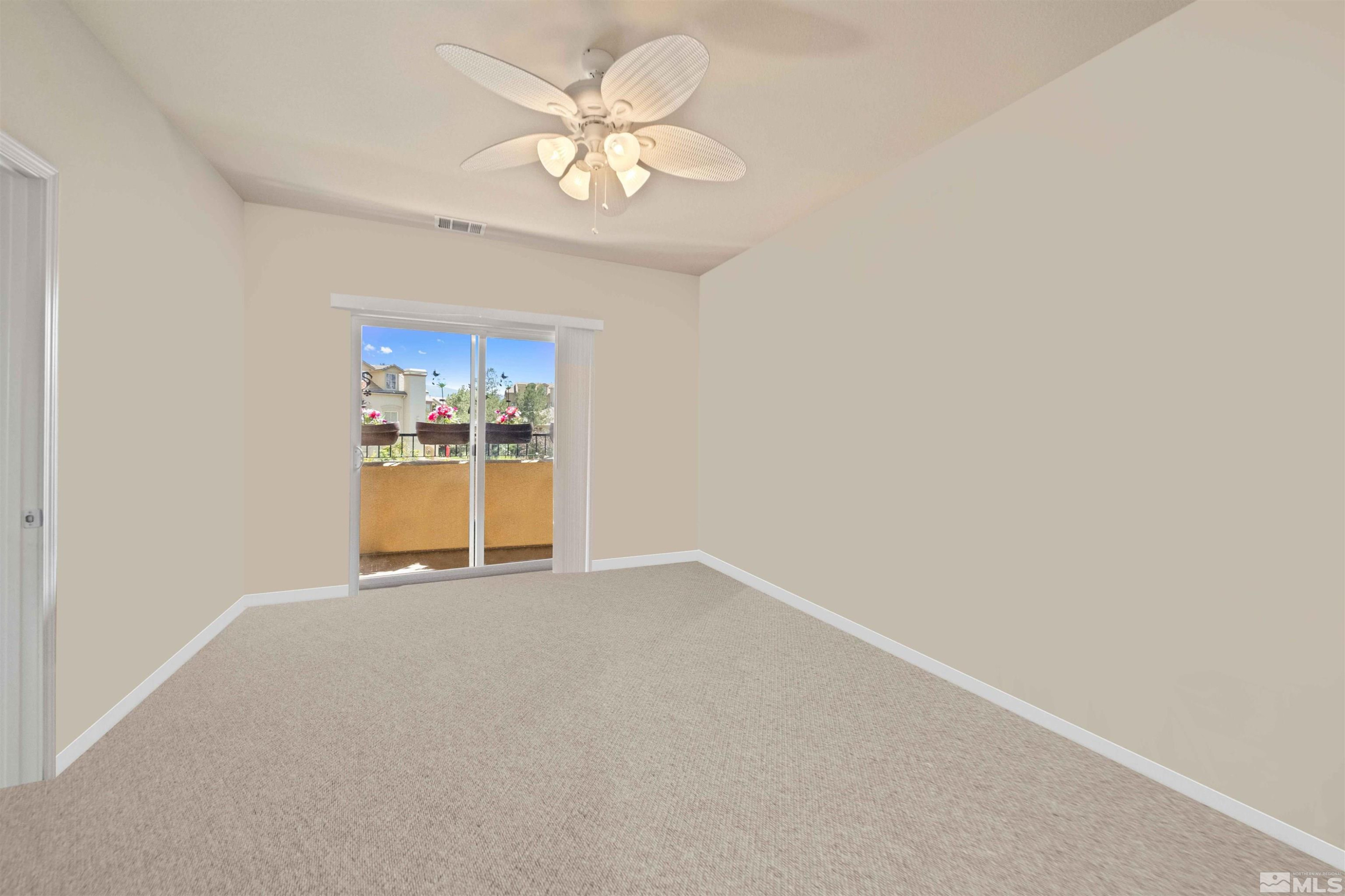 17000 Wedge Parkway Reno, NV 89511 - Photo 17 of 35 an empty room with a view of a kitchen