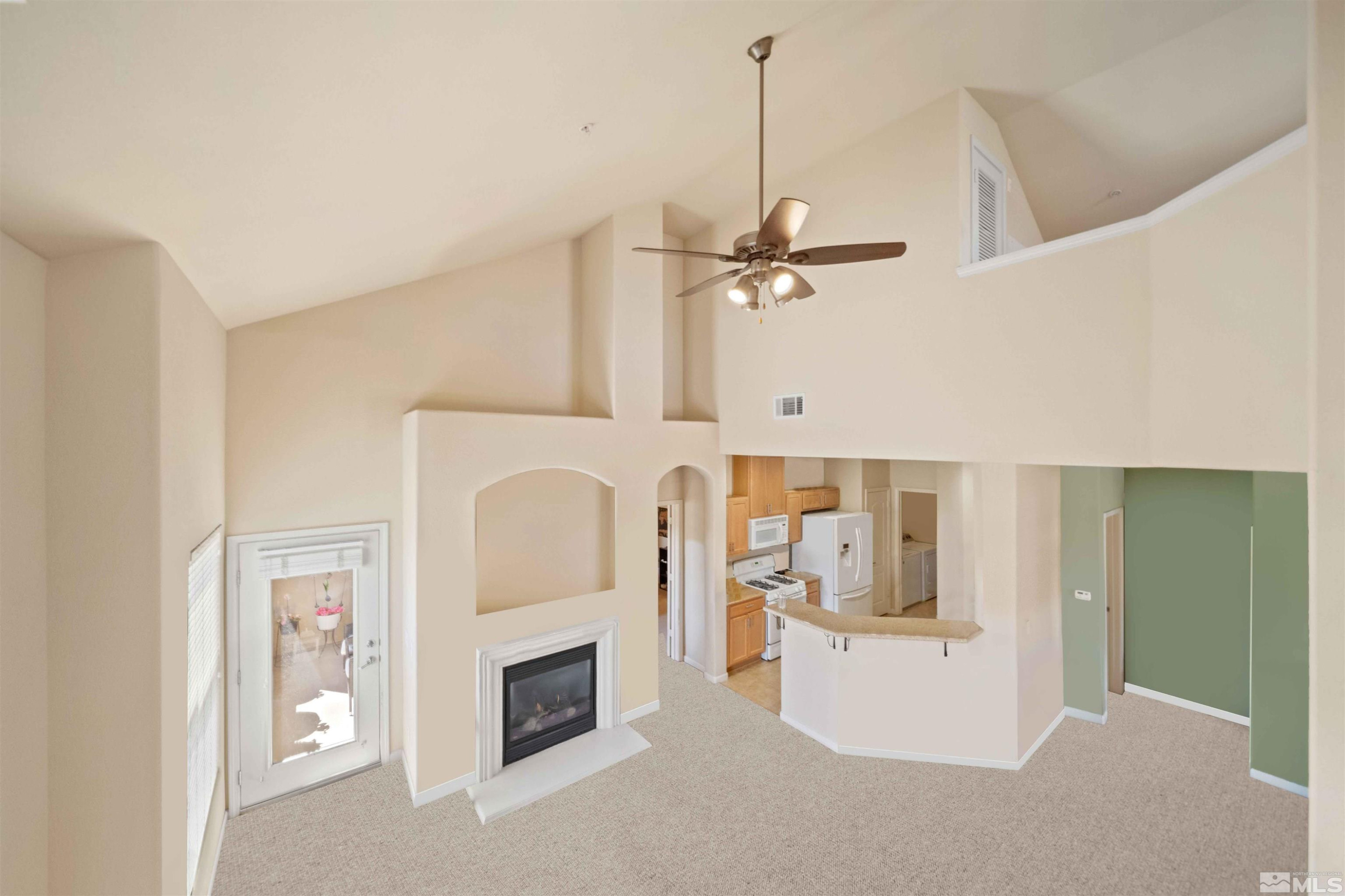 17000 Wedge Parkway Reno, NV 89511 - Photo 6 of 35 a view of living room with furniture and fireplace