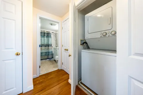 a view of a room that has a washer and dryer