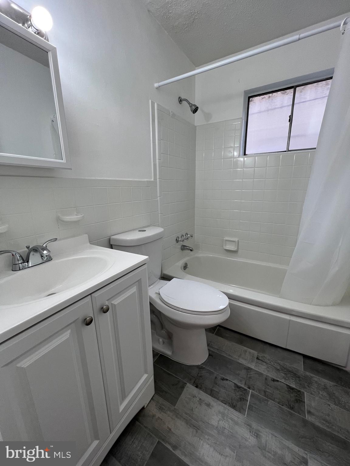 112 Clement Road, Unit B Oreland, PA 19075 - Photo 12 of 19 a bathroom with a sink toilet and shower