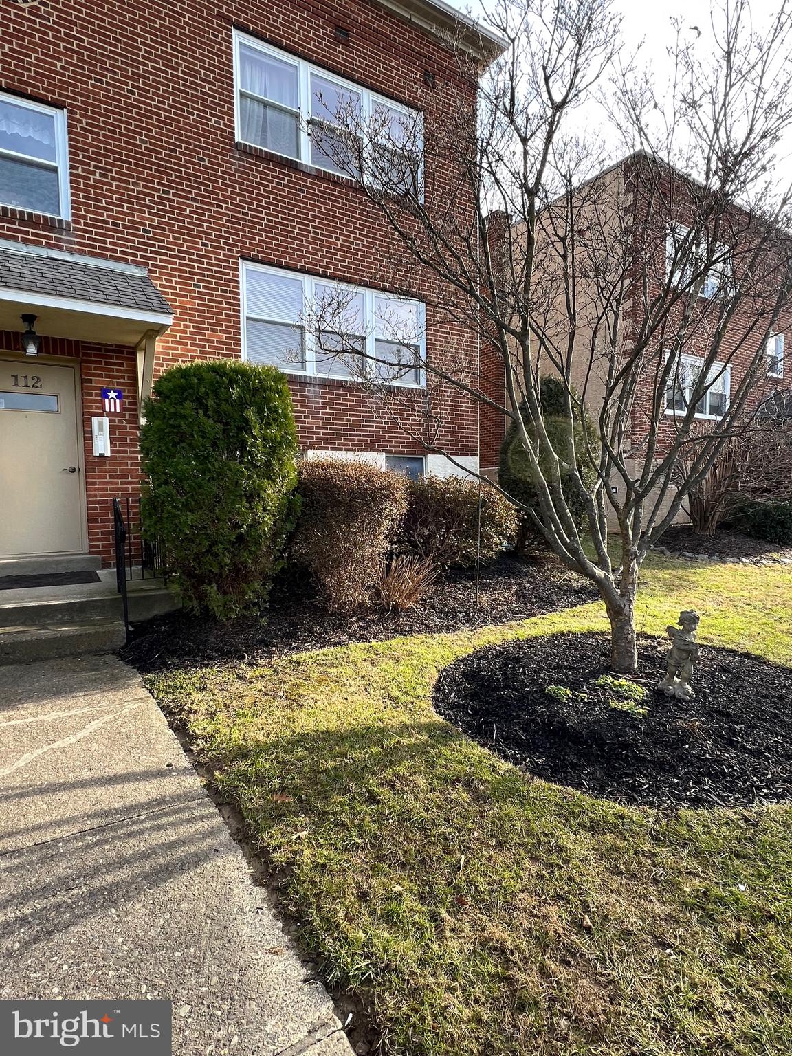 112 Clement Road, Unit B Oreland, PA 19075 - Photo 3 of 19 a front view of a house with a yard