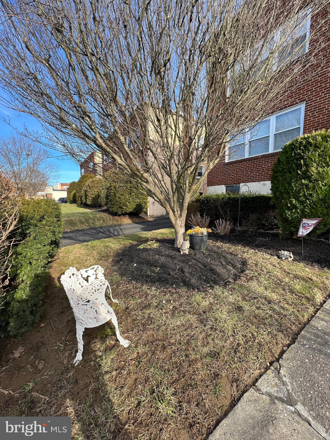 112 Clement Road, Unit B Oreland, PA 19075 - Photo 4 of 19 a view of a yard with chairs