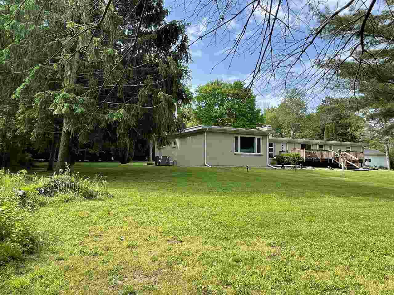 4724 Spring Brook Road Rockford, IL 61114 - Photo 4 of 44 a view of backyard with garden and trees