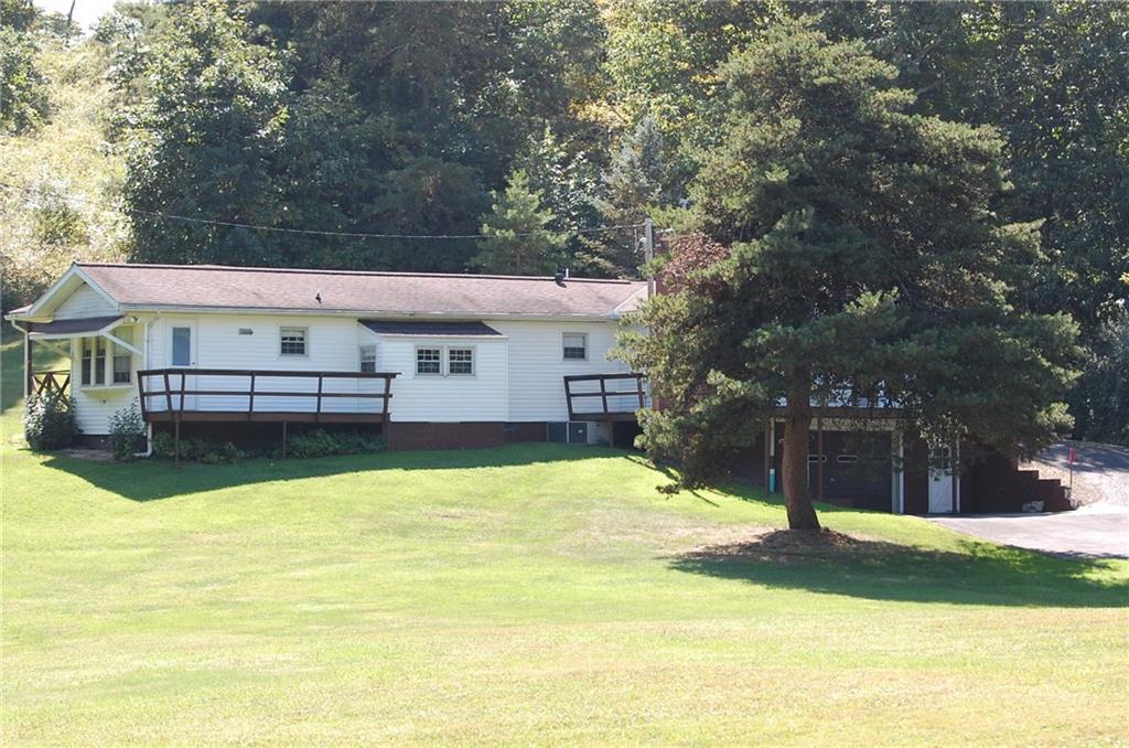 124 Gun Hill Road Wind Ridge, PA 15380 - Photo 1 of 25 a view of a house with swimming pool