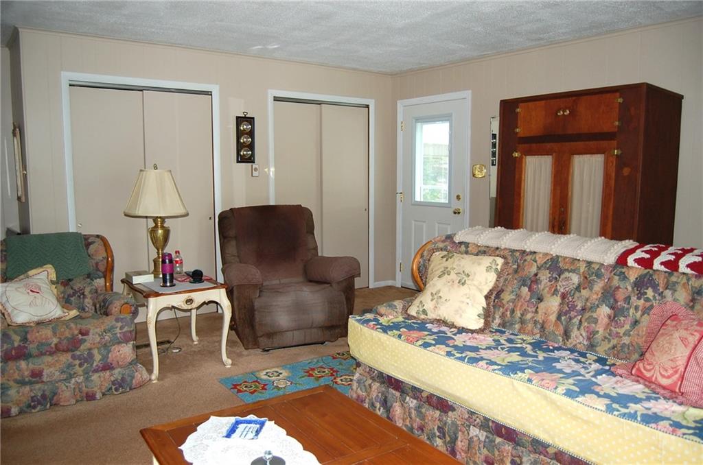 124 Gun Hill Road Wind Ridge, PA 15380 - Photo 12 of 25 a living room with furniture and a window