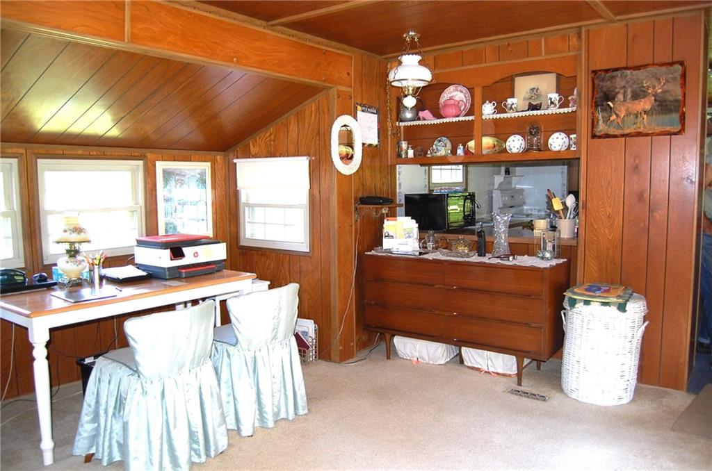 124 Gun Hill Road Wind Ridge, PA 15380 - Photo 13 of 25 a room with chandelier fan and a large window