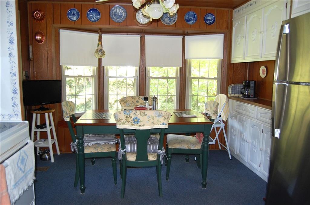 124 Gun Hill Road Wind Ridge, PA 15380 - Photo 16 of 25 a view of a dining room with furniture window and outside view