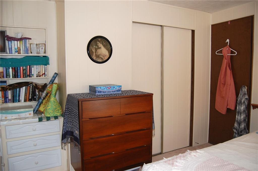 124 Gun Hill Road Wind Ridge, PA 15380 - Photo 24 of 25 a view of a hallway with closet and cabinet
