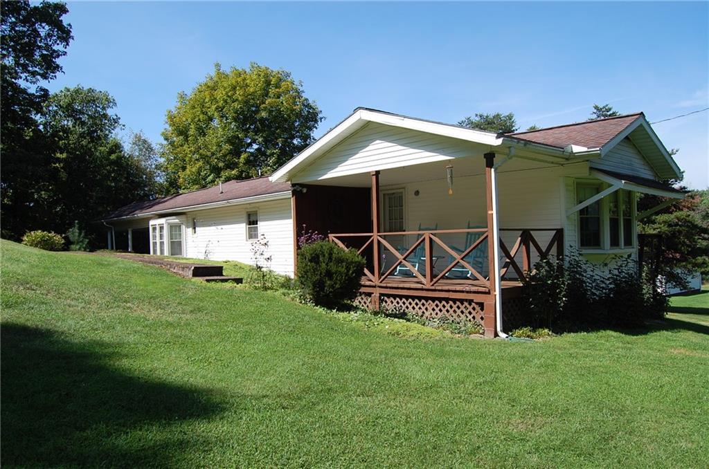 124 Gun Hill Road Wind Ridge, PA 15380 - Photo 3 of 25 a view of a house with backyard and garden