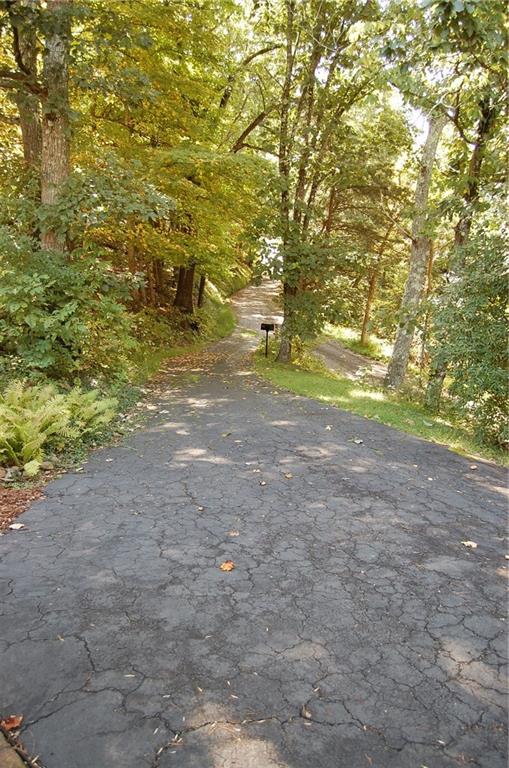 124 Gun Hill Road Wind Ridge, PA 15380 - Photo 5 of 25 a view of dirt field with trees in the background