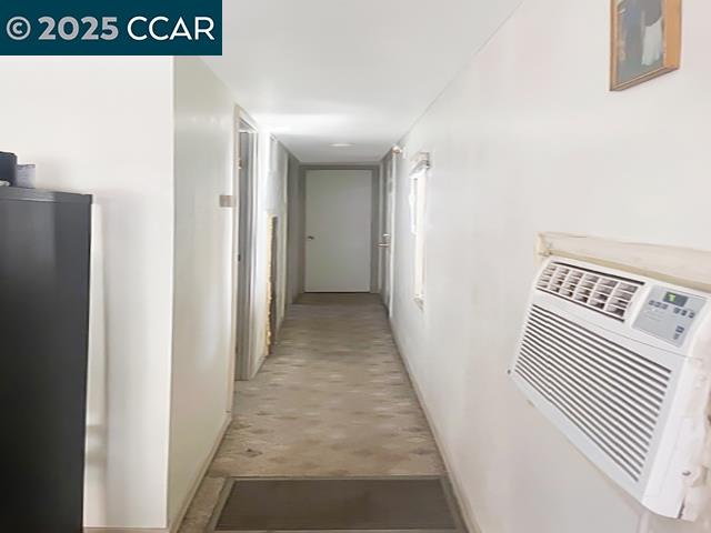 841 West Brannan Island Road, Unit 5 Isleton, CA 95641 - Photo 14 of 22 a view of a hallway with wooden floor