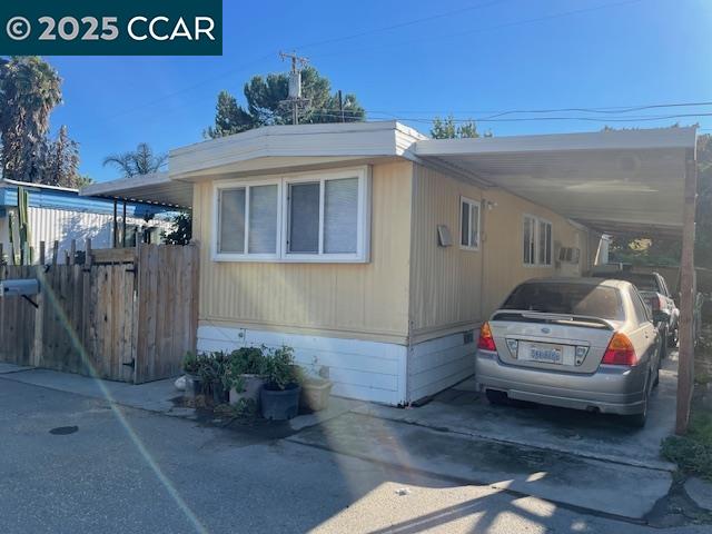 841 West Brannan Island Road, Unit 5 Isleton, CA 95641 - Photo 22 of 22 a car parked in front of a house