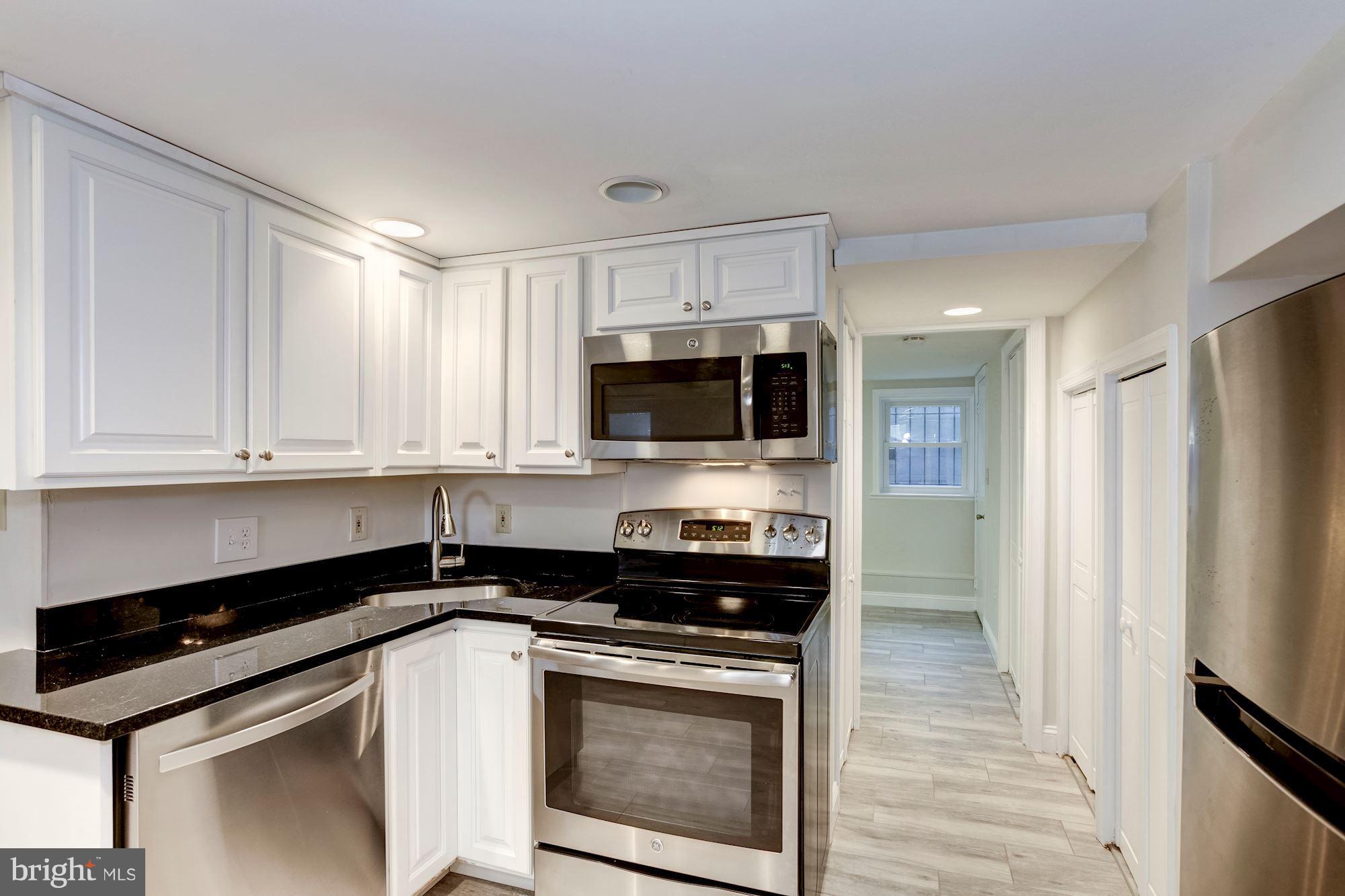 1314 Riggs Street Northwest Washington, DC 20009 - Photo 23 of 28 Full kitchen in basement unit