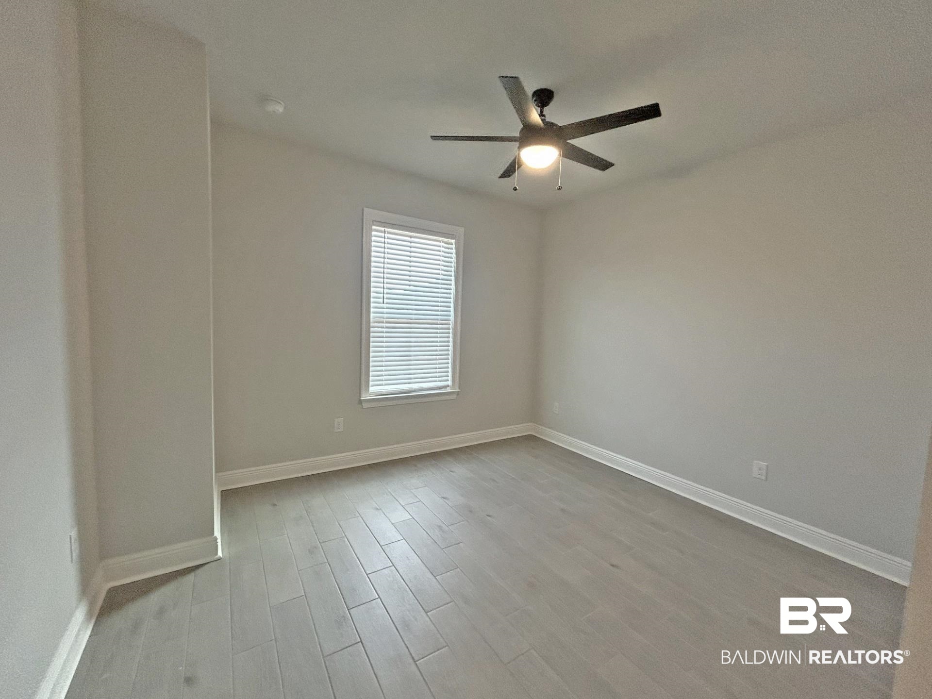 1748 Breckinridge Place Foley, AL 36535 - Photo 22 of 25 Unfurnished room featuring light wood finished floors and ceiling fan