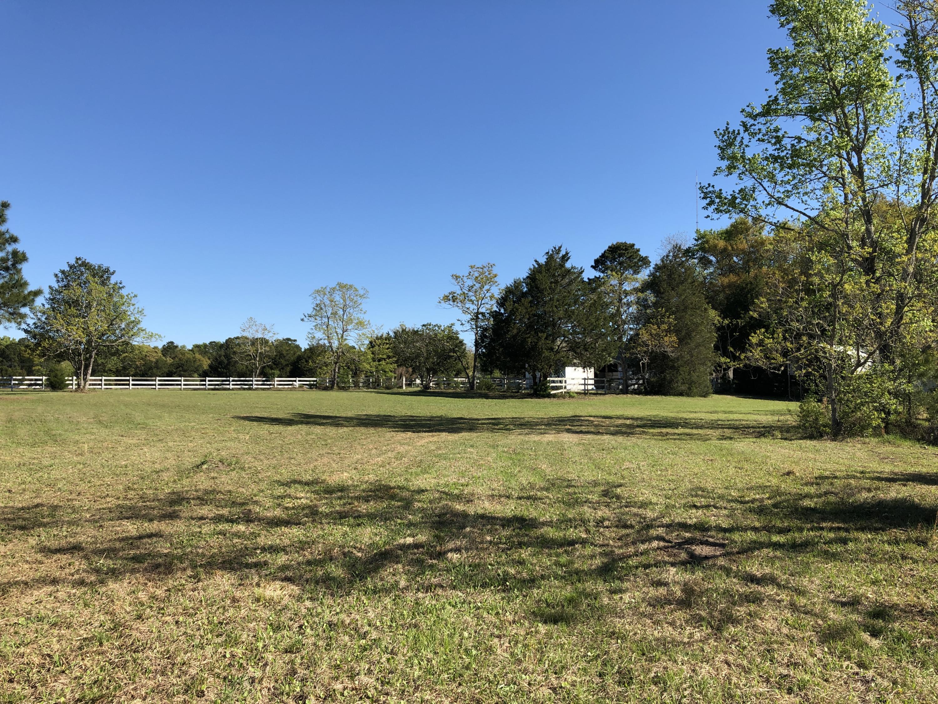 4911 Seewee Road Awendaw, SC 29429 - Photo 1 of 19 Right rear towards stable and front left
