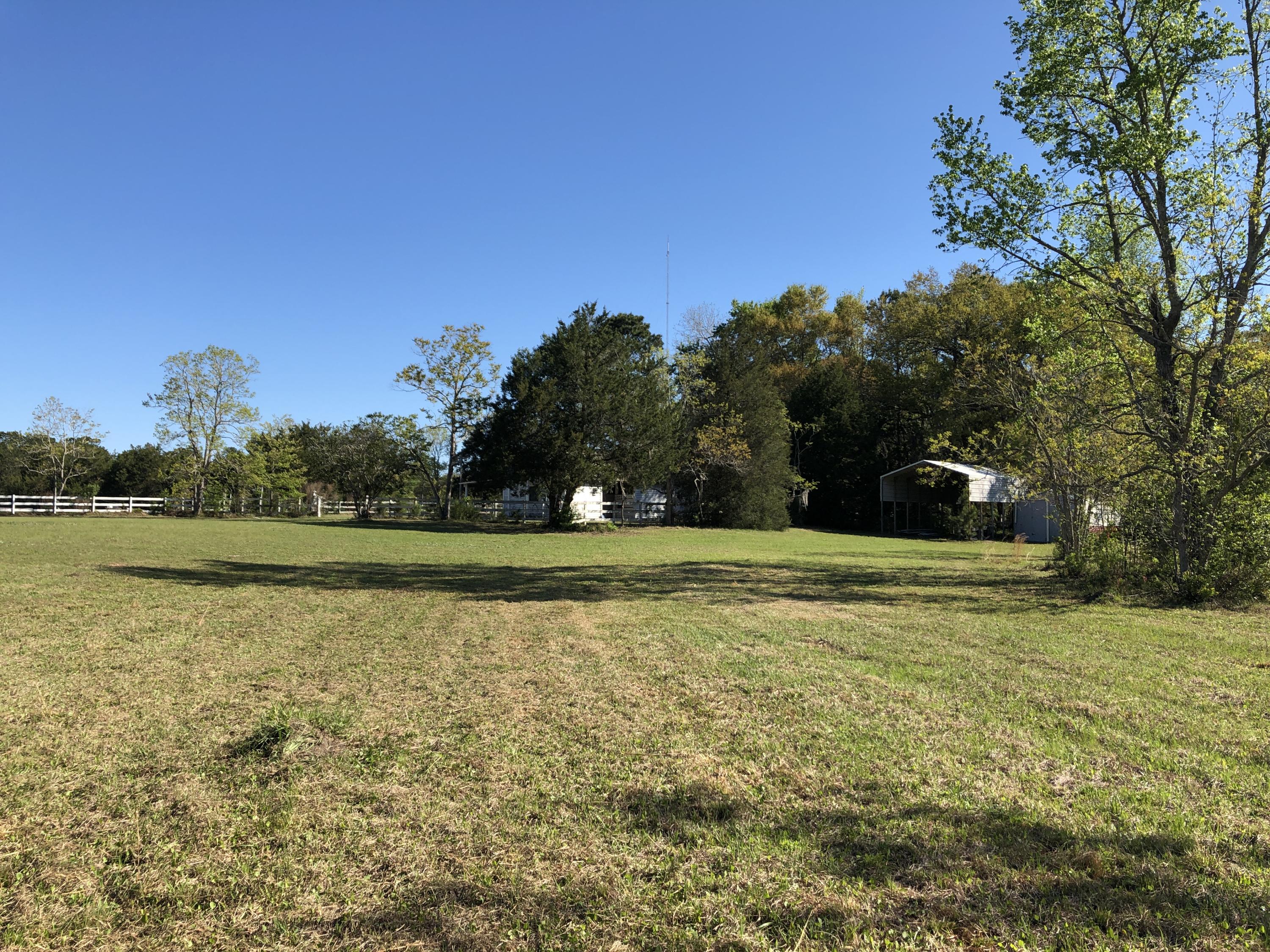 4911 Seewee Road Awendaw, SC 29429 - Photo 11 of 19 Right rear to stable & boat shed
