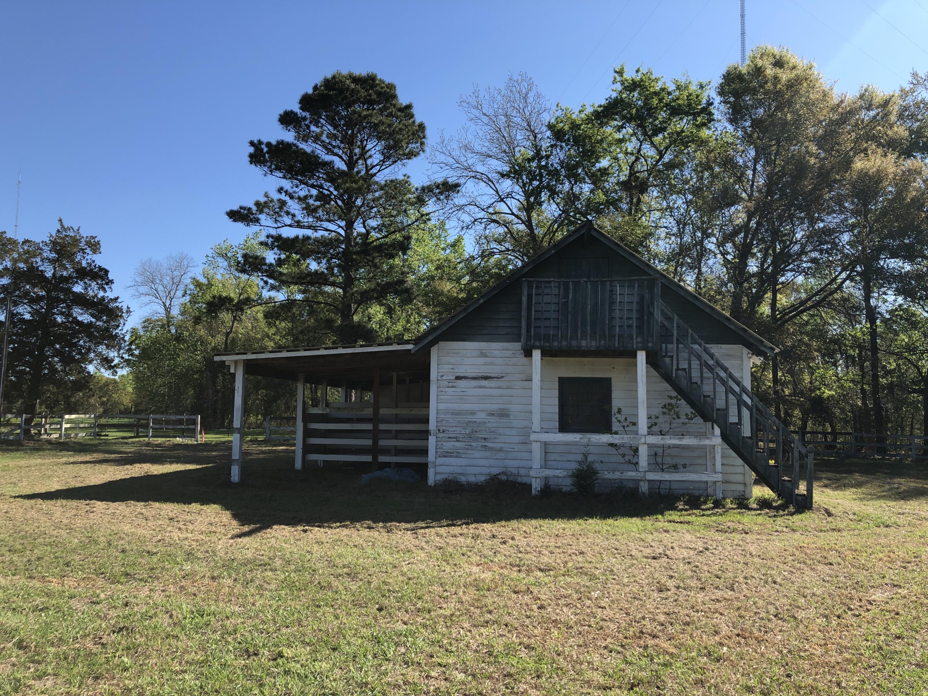 4911 Seewee Road Awendaw, SC 29429 - Photo 16 of 19 Stable right side