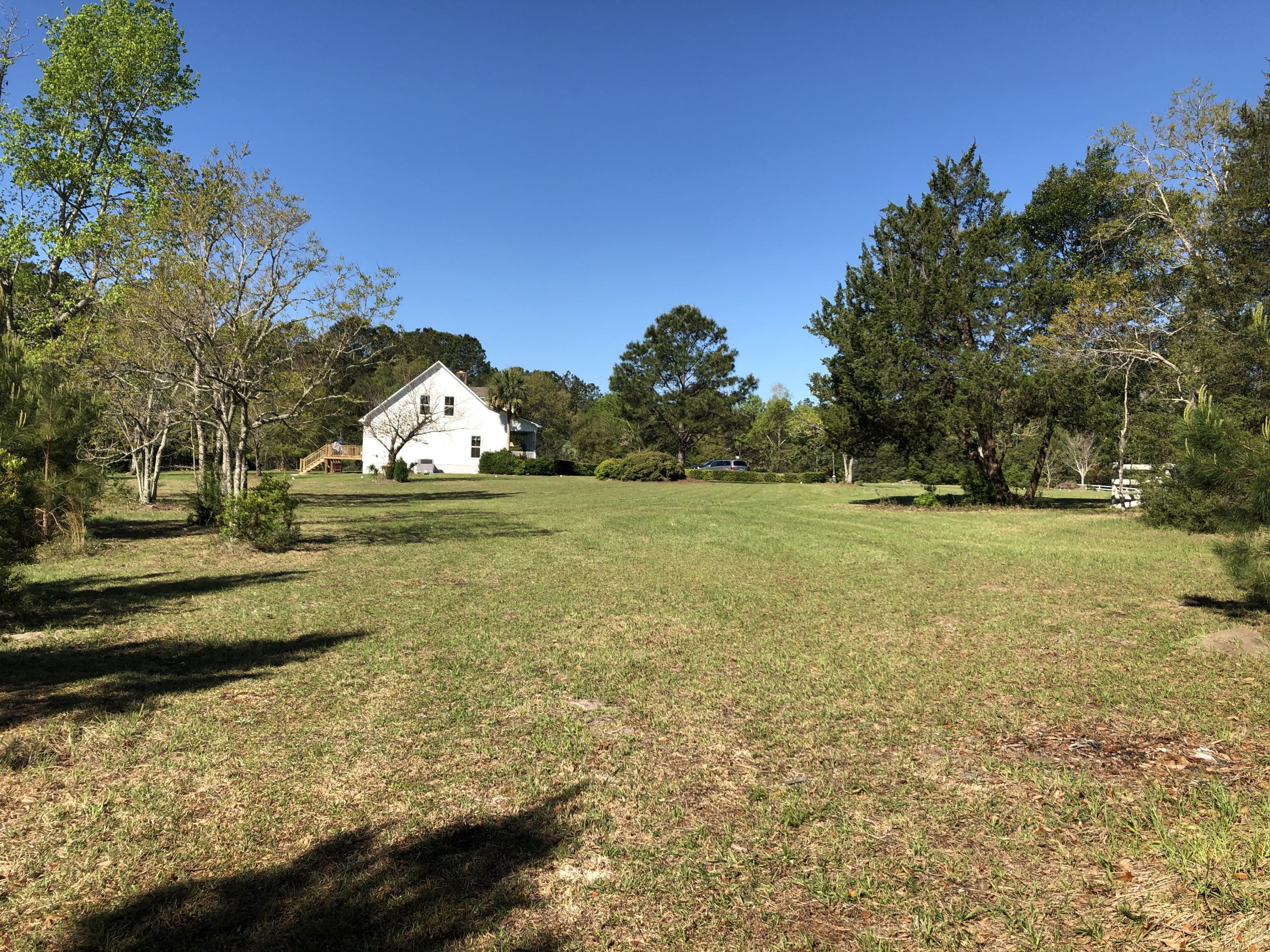 4911 Seewee Road Awendaw, SC 29429 - Photo 4 of 19 Left mid to house next door