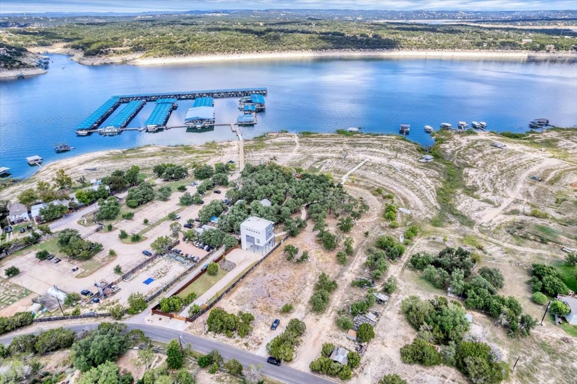 1519 Chipmunk Road Austin, TX 78734 - Photo 17 of 20 a view of a lake with a table and chairs