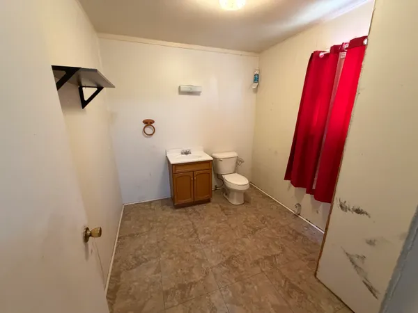 a bathroom with a sink and a toilet