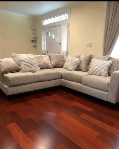 a living room with a couch and a coffee table