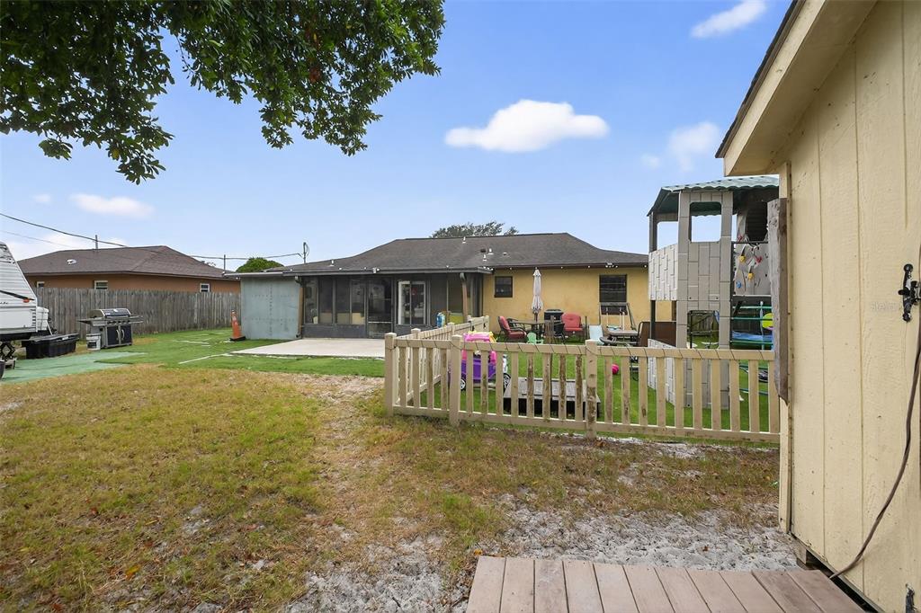 1644 Ruth Street Cocoa, FL 32926 - Photo 30 of 38 a view of a house with a yard